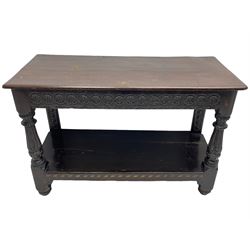  17th century oak buffet or side table, moulded rectangular top over guilloche carved frieze rails and rear upright supports, turned and flute carved front supports united by under tier