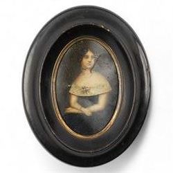 19th century Russian miniature oval portrait of a lady, half length, seated in ebonised fr...