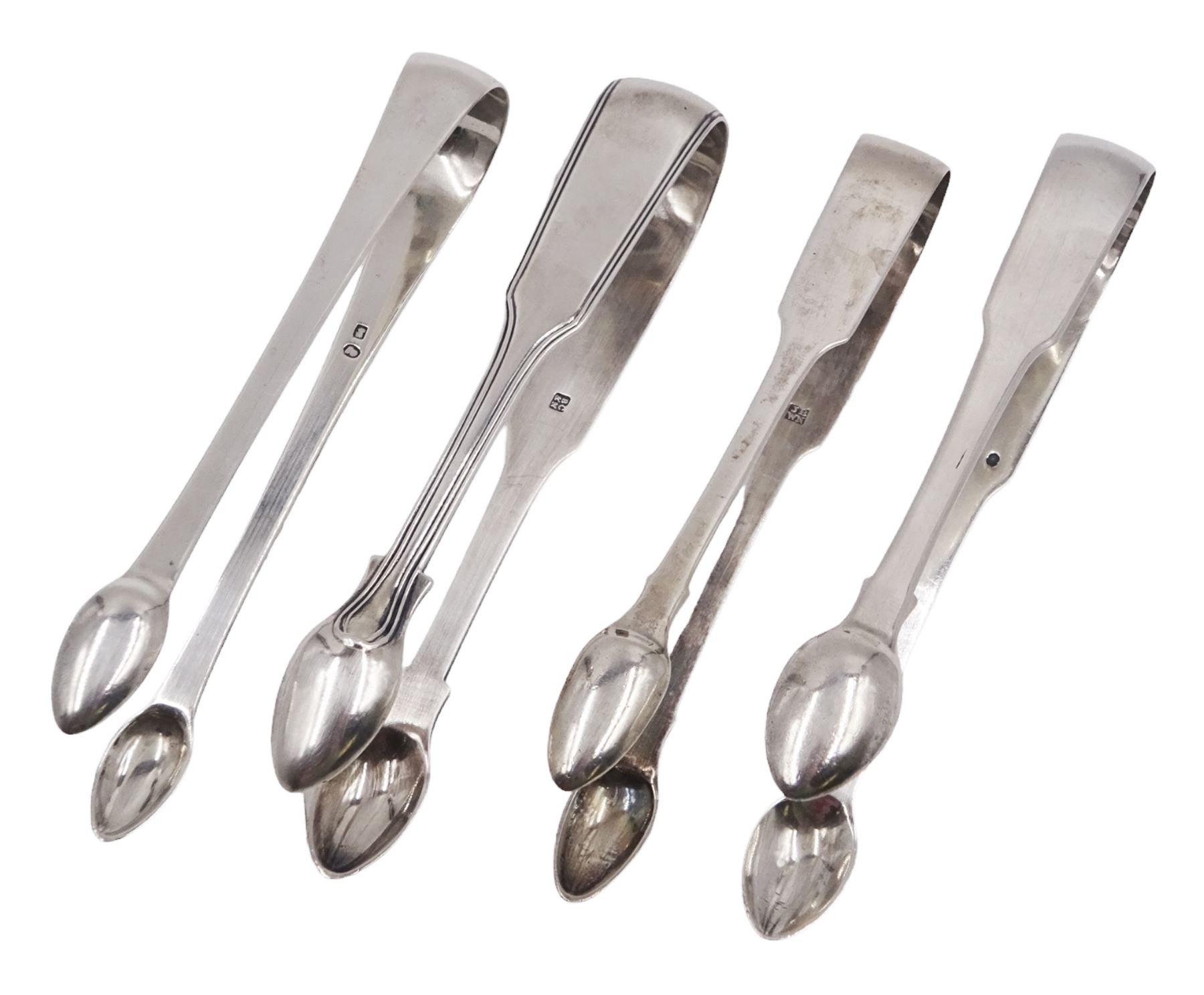 Four pairs of George III and later York silver sugar tongs, to include Fiddle pattern pair with reed borders and a plain pair, both hallmarked James Barber, George Cattle II & William North, and two plain Fiddle pattern pairs, one hallmarked James Barber & William Whitwell, the other hallmarked James Barber & William North, all engraved with initials 