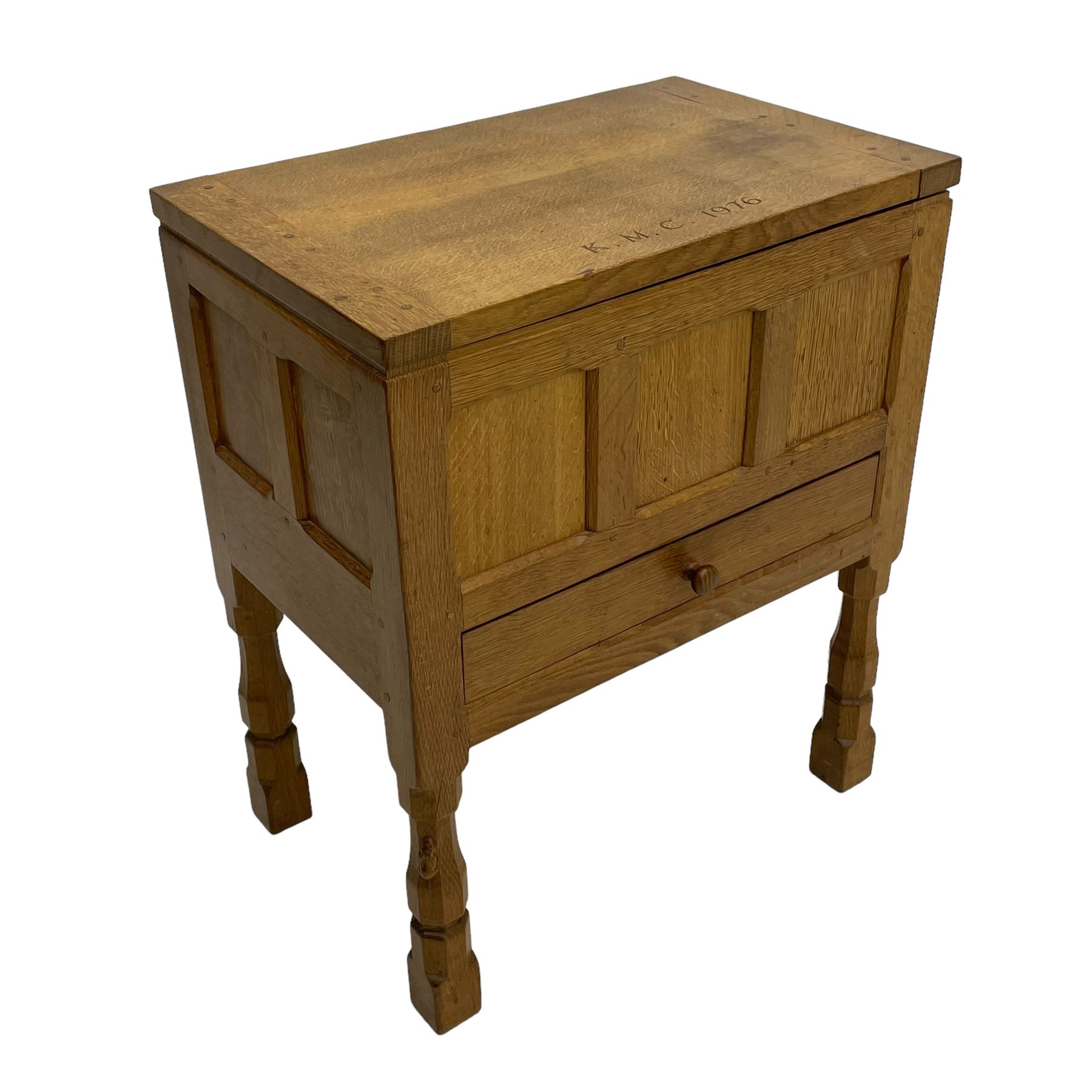 Mouseman - oak work or sewing box, rectangular adzed top inscribed 'L. M. C. 1976' enclosing vacant interior, triple panelled front and double panelled sides, fitted with single drawer, on octagonal supports, carved with mouse signature, by the workshop of Robert Thompson, Kilburn 