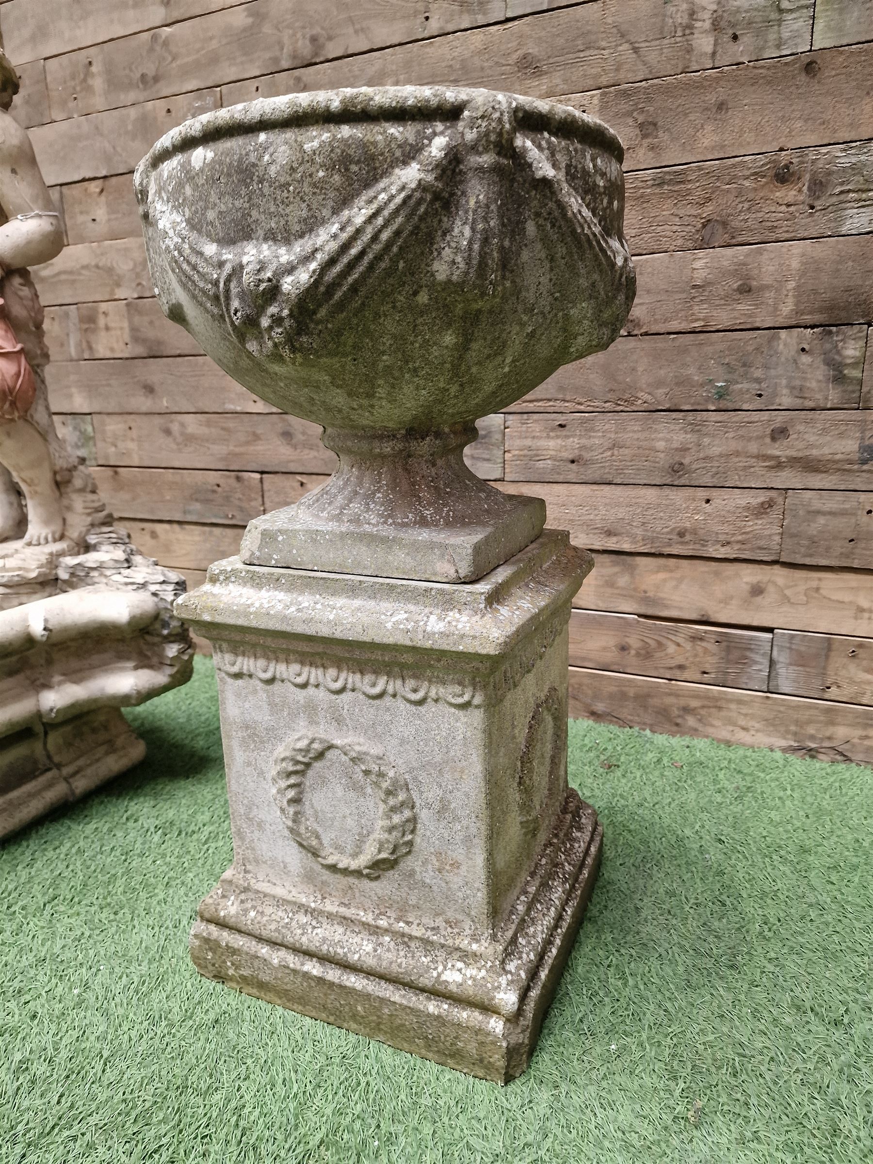 Three section cast stone garden figure of a boy carrying fishing net and a satchel with a water feature together with a cast stone planter on plinth - THIS LOT IS TO BE COLLECTED BY APPOINTMENT FROM DUGGLEBY STORAGE, GREAT HILL, EASTFIELD, SCARBOROUGH, YO11 3TX