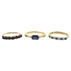 Gold three stone emerald cut sapphire and round brilliant cut diamond ring, sapphire and diamond half eternity ring and a seven stone sapphire ring, all hallmarked 9ct