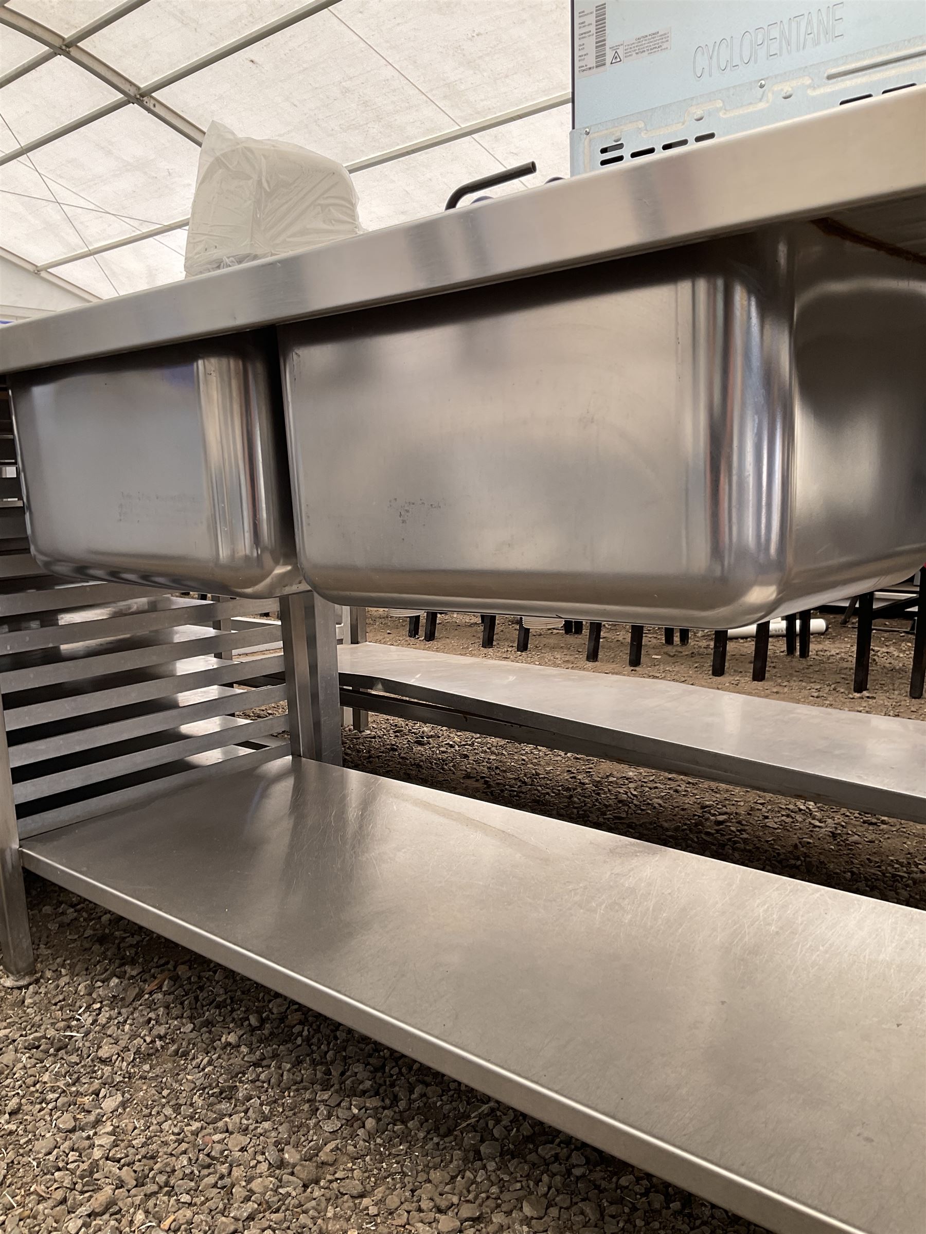 Commercial stainless steel double sink and drainer, hot and cold taps, under-tier shelf, two waste barrel plugs - THIS LOT IS TO BE COLLECTED BY APPOINTMENT FROM DUGGLEBY STORAGE, GREAT HILL, EASTFIELD, SCARBOROUGH, YO11 3TX