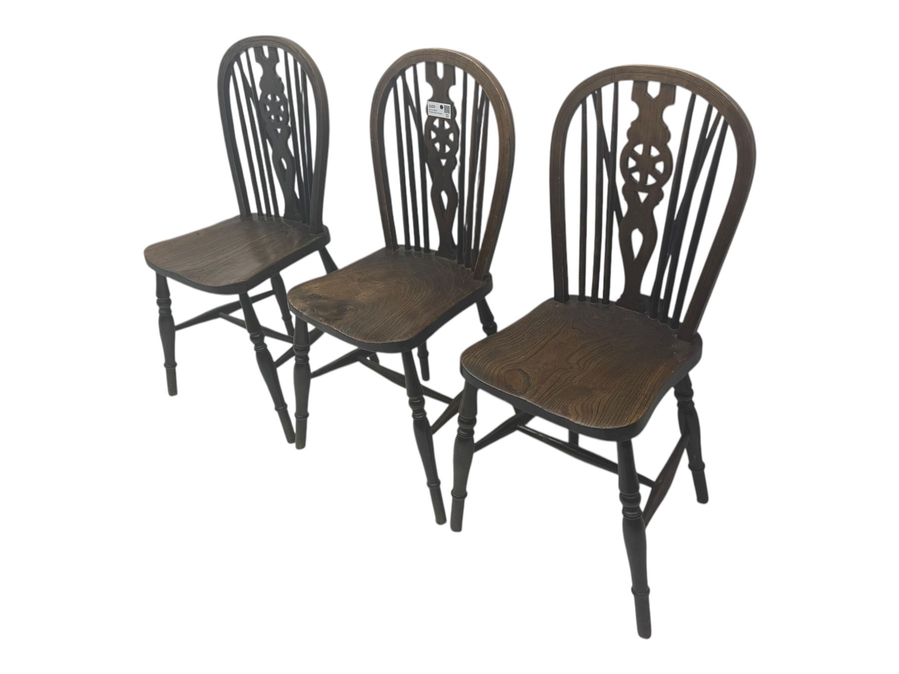 Set of six 19th century elm and ash dining chairs, hoop back with pierced wheel-shaped central splat, shaped saddle seat, raised on turned supports united by H-stretchers