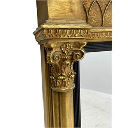 Regency design giltwood overmantel mirror, projecting cornice over pointed arcade frieze and foliate moulded upper edge, plain mirror plate within reed moulded ebonised slip, flanked by cluster columns with acanthus and scroll decorated Composite order capitals 