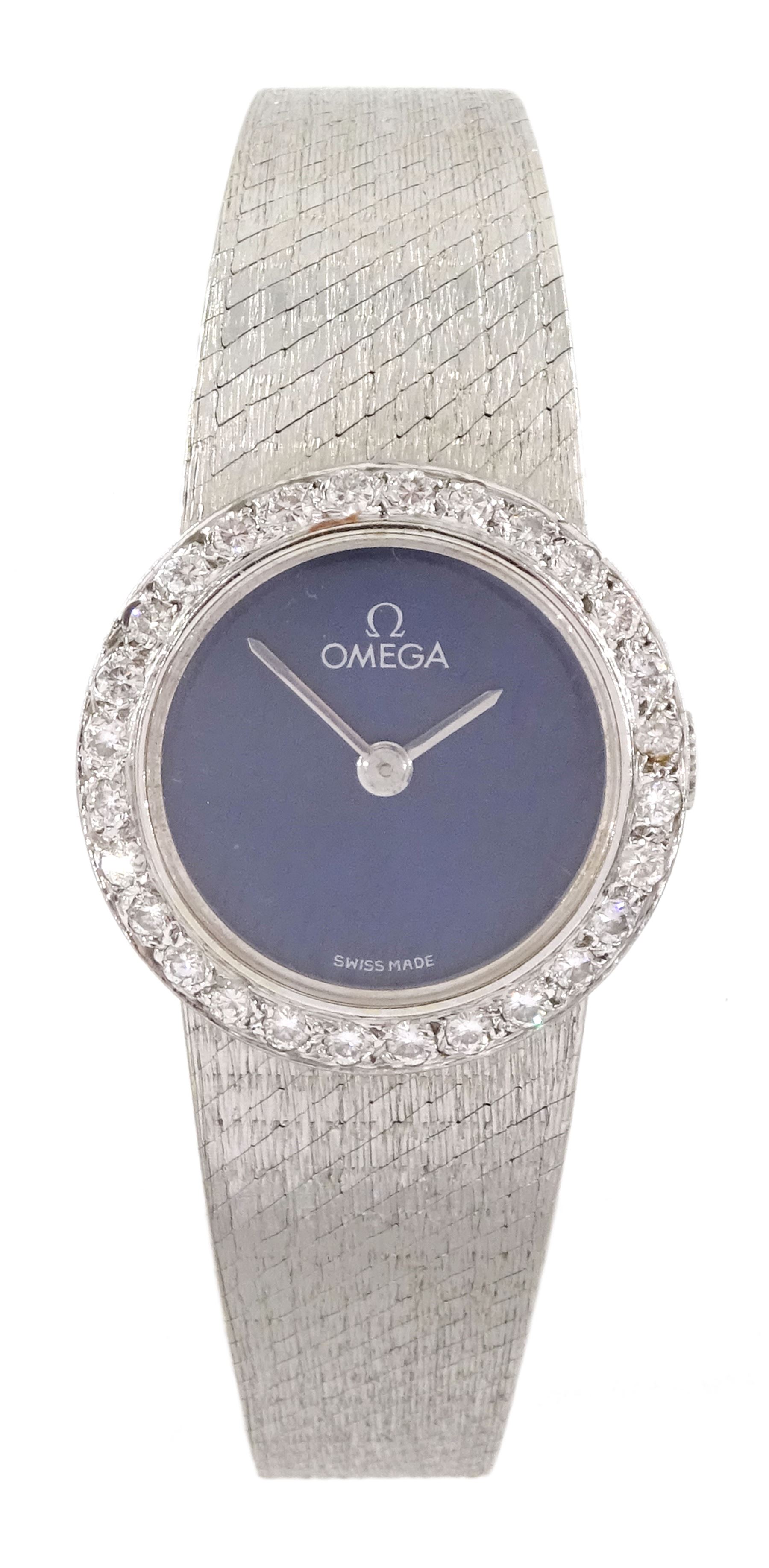 Omega ladies 18ct white gold manual wind wristwatch, Cal. 625, blue dial with round brilliant cut diamond bezel, on integral Omega 18ct white gold bracelet