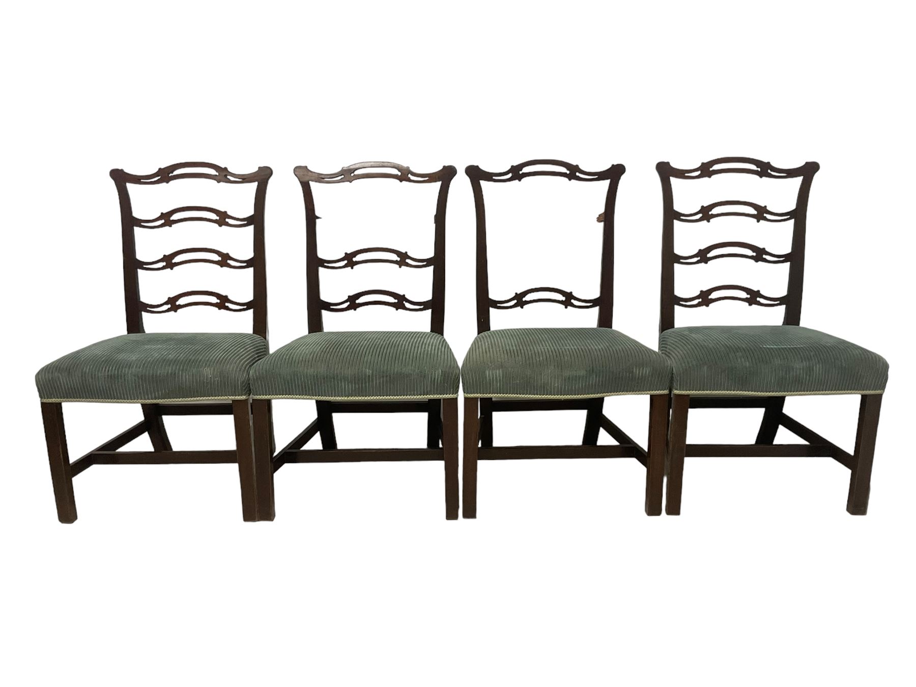 Set of twelve (10+2) Chippendale revival stained beech dining chairs, pierced waived ladder backs with over-stuffed over seats, on square moulded supports joined by stretchers