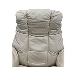 Ekornes Stressless - swivel armchair upholstered in cream leather (W81cm, H103cm); together with matching stool (W49cm)