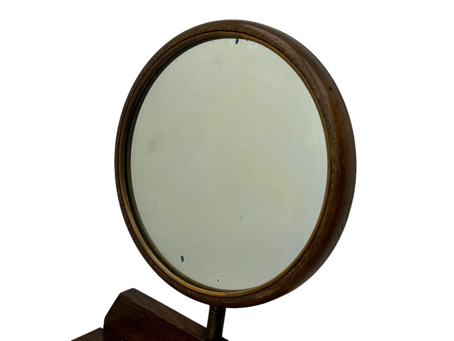 Early 20th century oak vanity stand, with circular adjustable mirror, brass towel rails to the sides, marble inset top and upper compartment, over additional storage compartment with hinged front, on splayed supports with stretchers