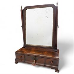 George III mahogany upright swing toilet mirror, with brass finials, bevelled plate and gilt slip, the base with three drawers and on bracket feet W39cm