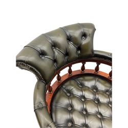 Captain's standard desk chair, upholstered in studded green leather