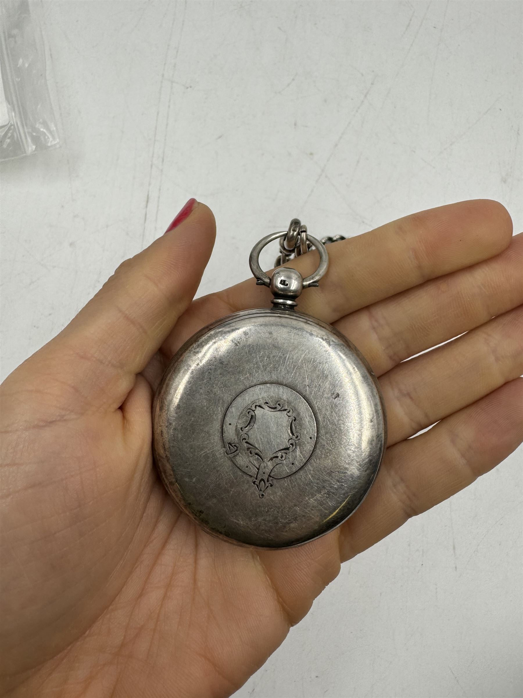 Victorian silver open faced lever pocket watch, the white dial with black Roman numerals and a subsidiary seconds dial, numbered 11368, case hallmarked Joseph Hirst, London 1925, with hallmarked silver watch chain