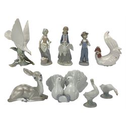 Seven Lladro figures including group of two doves, rooster, boy with accordion, deer, dove in flight , two geese and two Nao figures