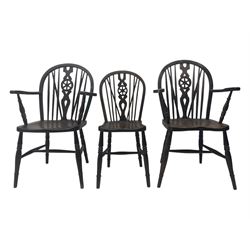 Set of six 19th century elm and ash dining chairs, hoop back with pierced wheel-shaped central splat, shaped saddle seat, raised on turned supports united by H-stretchers