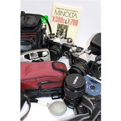 Collection of cameras, including Minolta, Fujica, and Kodak examples and accessories