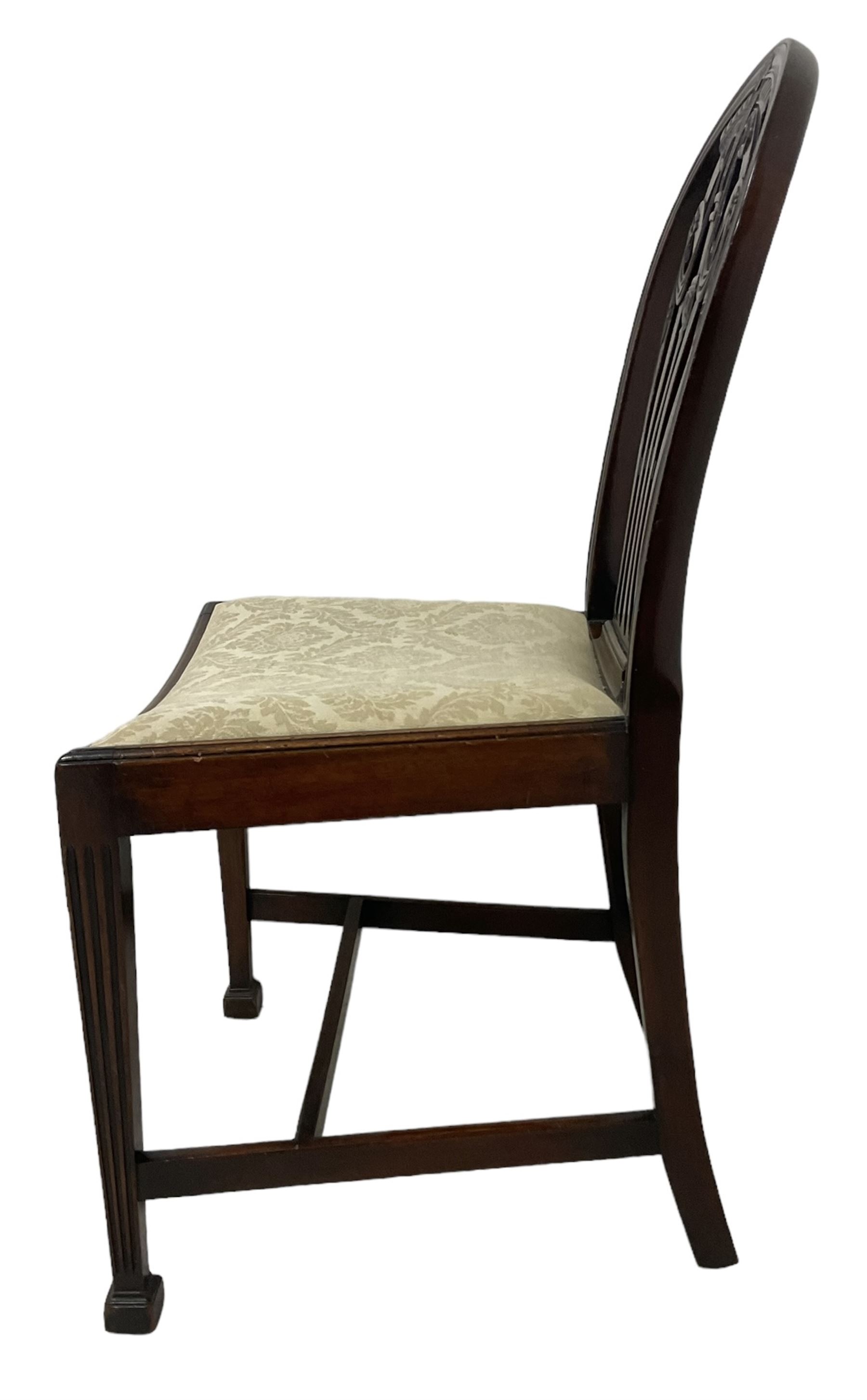 Pair of Georgian design mahogany D-end tables, reeded edge over banded frieze, on square tapering supports; with set of four (3+1) Hepplewhite design mahogany dining chairs, elaborately pierced and carved splat with festoons over dished seat, on fluted supports (W63cm H98cm)