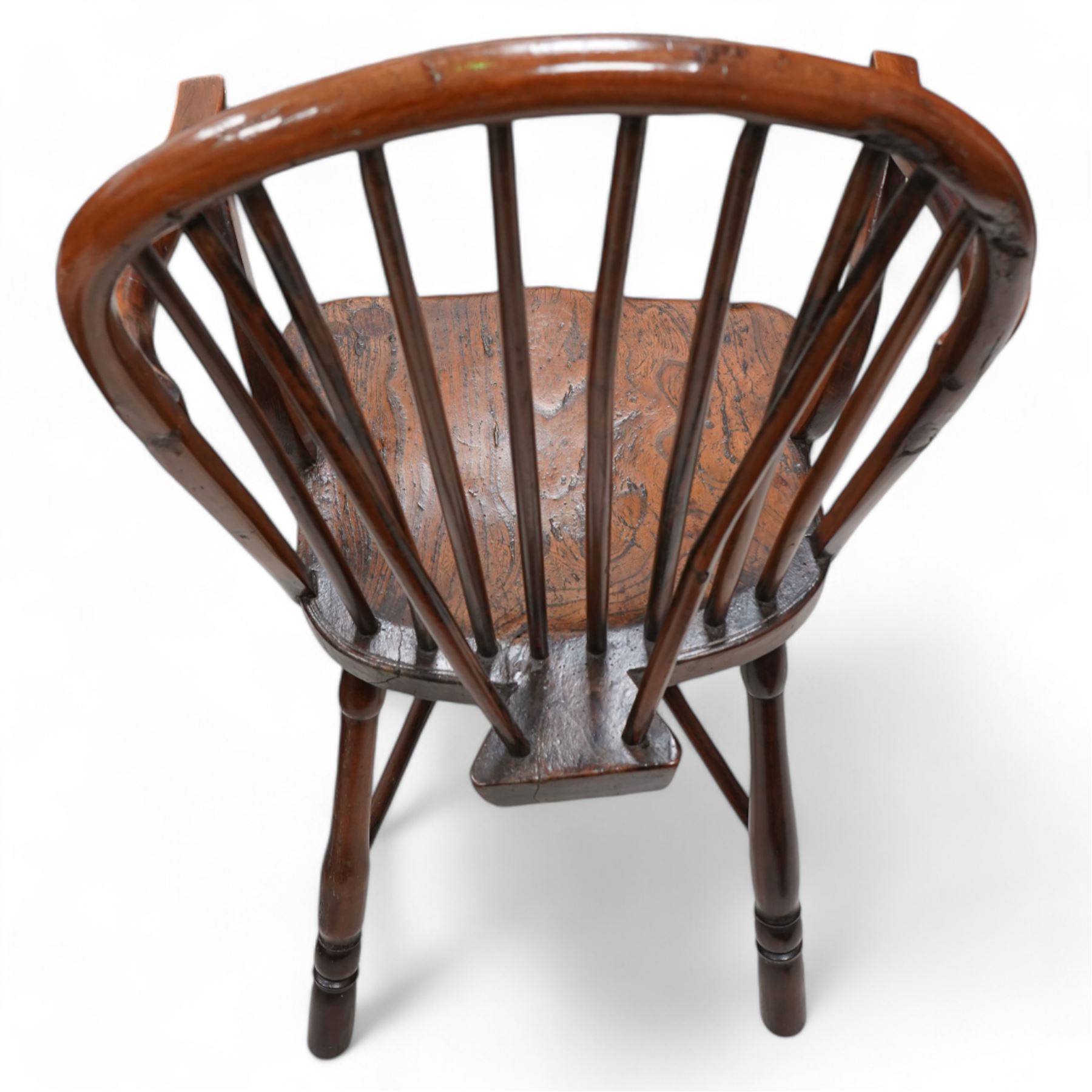 19th century yew wood and elm Thames Valley Windsor armchair, hoop and stick back over shaped arms, dished elm seat on turned supports united by crinoline stretcher 