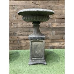 Pair of Victorian design cast stone squat garden urns, egg and dart border, raised on pedestal base and square fielded plinth - THIS LOT IS TO BE COLLECTED BY APPOINTMENT FROM DUGGLEBY STORAGE, GREAT HILL, EASTFIELD, SCARBOROUGH, YO11 3TX