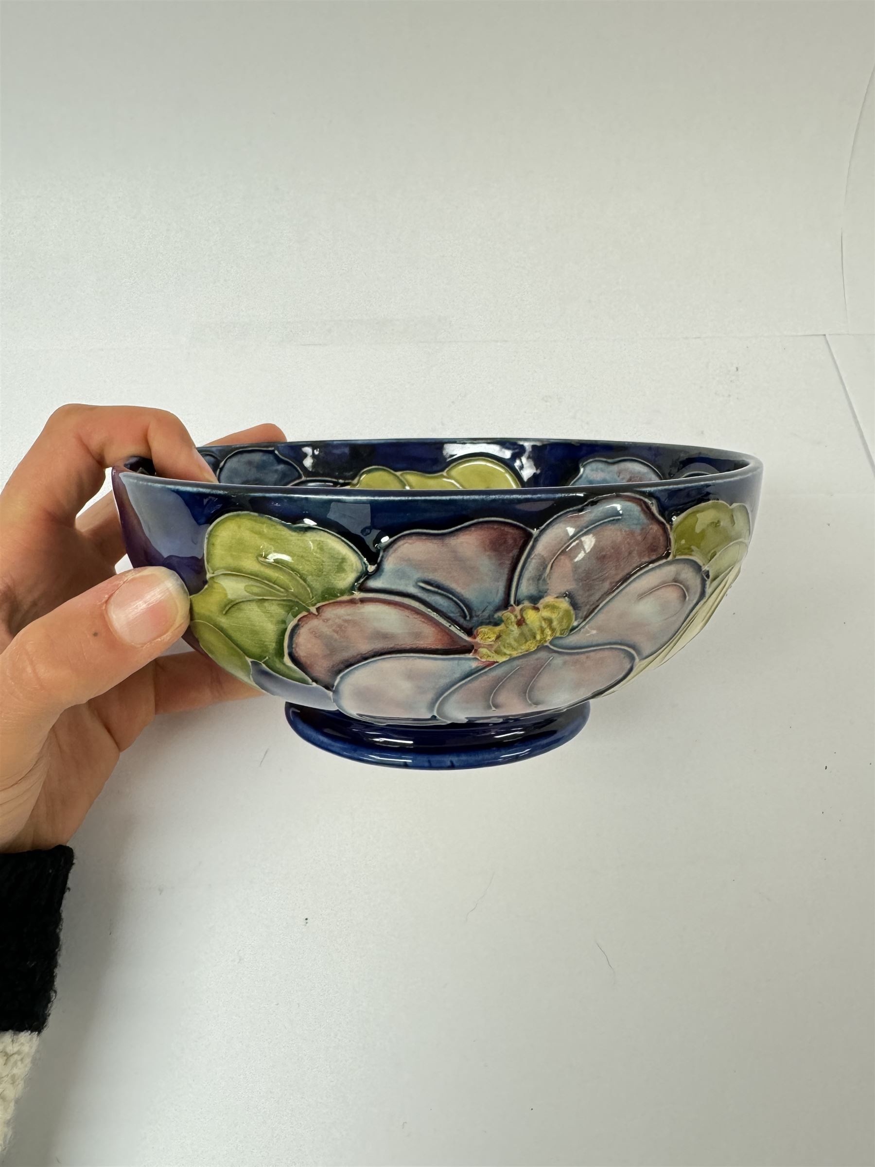 Moorcroft bowl in Clematis pattern, together with Moorcroft pedestal bowl in Anemone pattern both with makers mark below, pedestal dish H12cm 