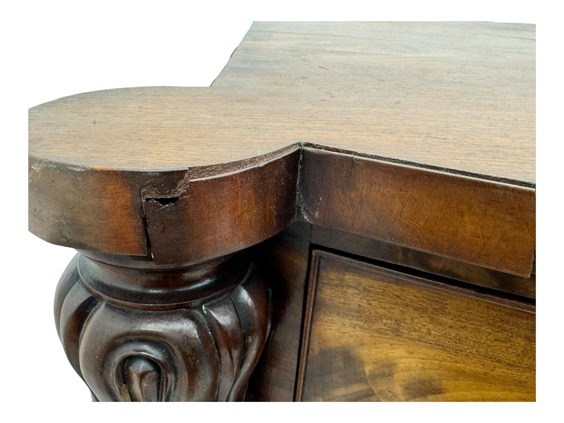 Early Victorian mahogany bow front chest, two short over three long graduating cockbeaded drawers, flanked by faceted columns with carved acanthus leaf capitals, standing on turned bun supports with fluted detailing