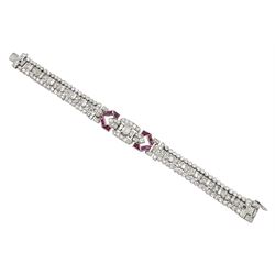 Art Deco platinum diamond and ruby bracelet, circa 1920-1930, the central panel set with a...