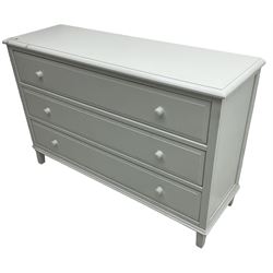 Contemporary wide white painted straight-front chest, fitted with three drawers