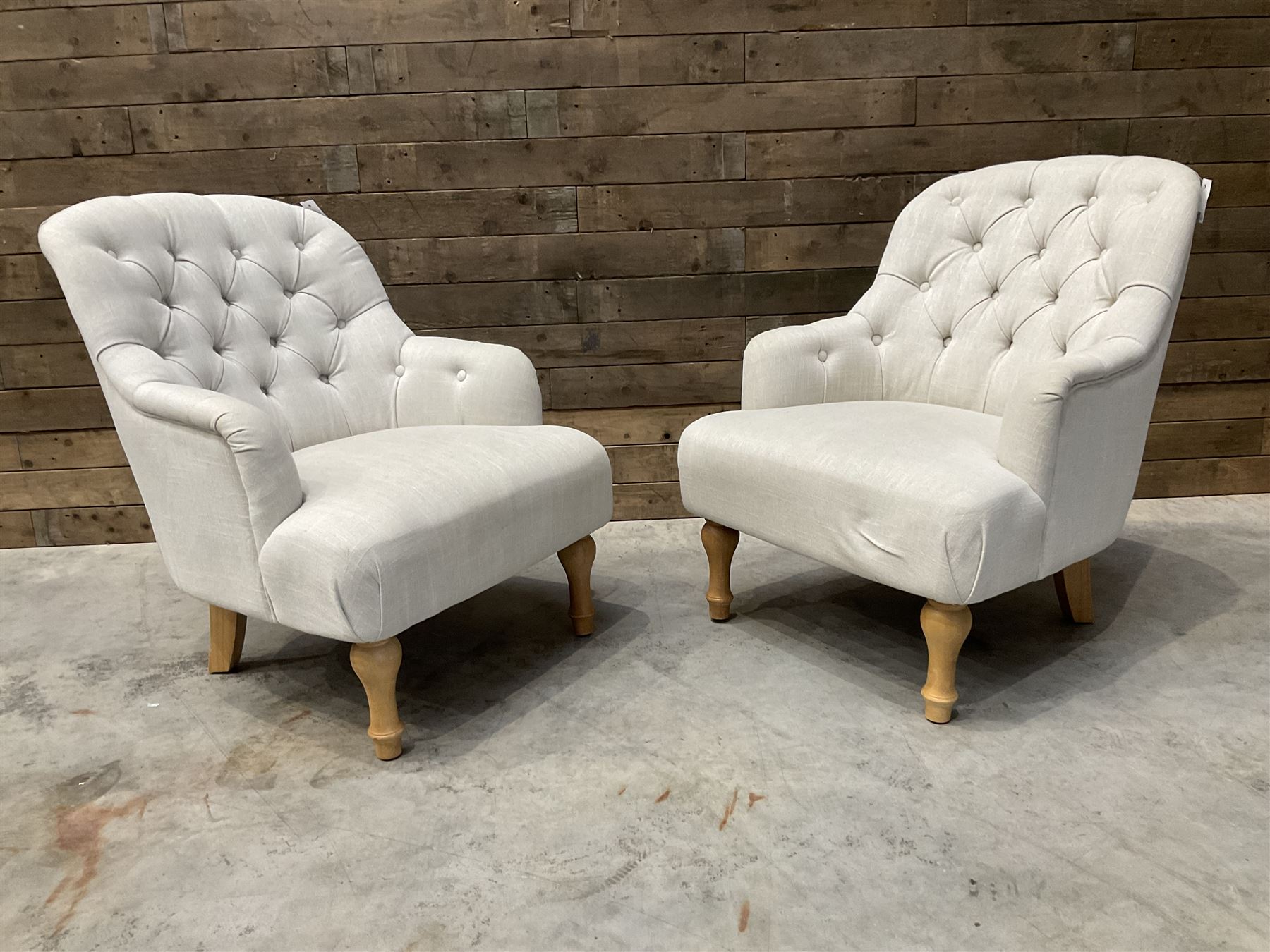 Pair of armchairs upholstered in button back linen fabric