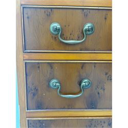 Mid-to-late 20th century yew wood bureau bookcase, raised bookcase enclosed by glazed door, the fall front revealing fitted interior, four graduating cock-beaded drawers below, on bracket feet