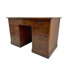 Late 19th to early 20th century walnut pedestal desk, rectangular top inset with red toole...