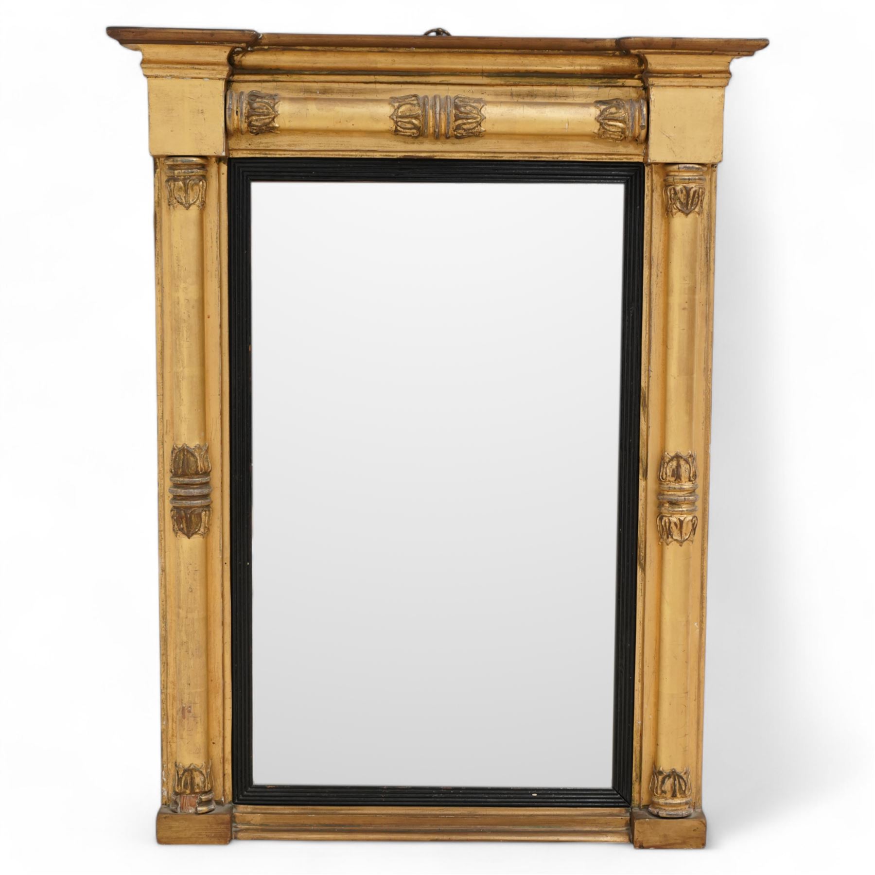 Regency gilt and gesso framed pier glass mirror, inverted break-front pediment over acanthus moulded half pilasters of Neoclassical design, rectangular bevelled plate within ebonised reeded slip