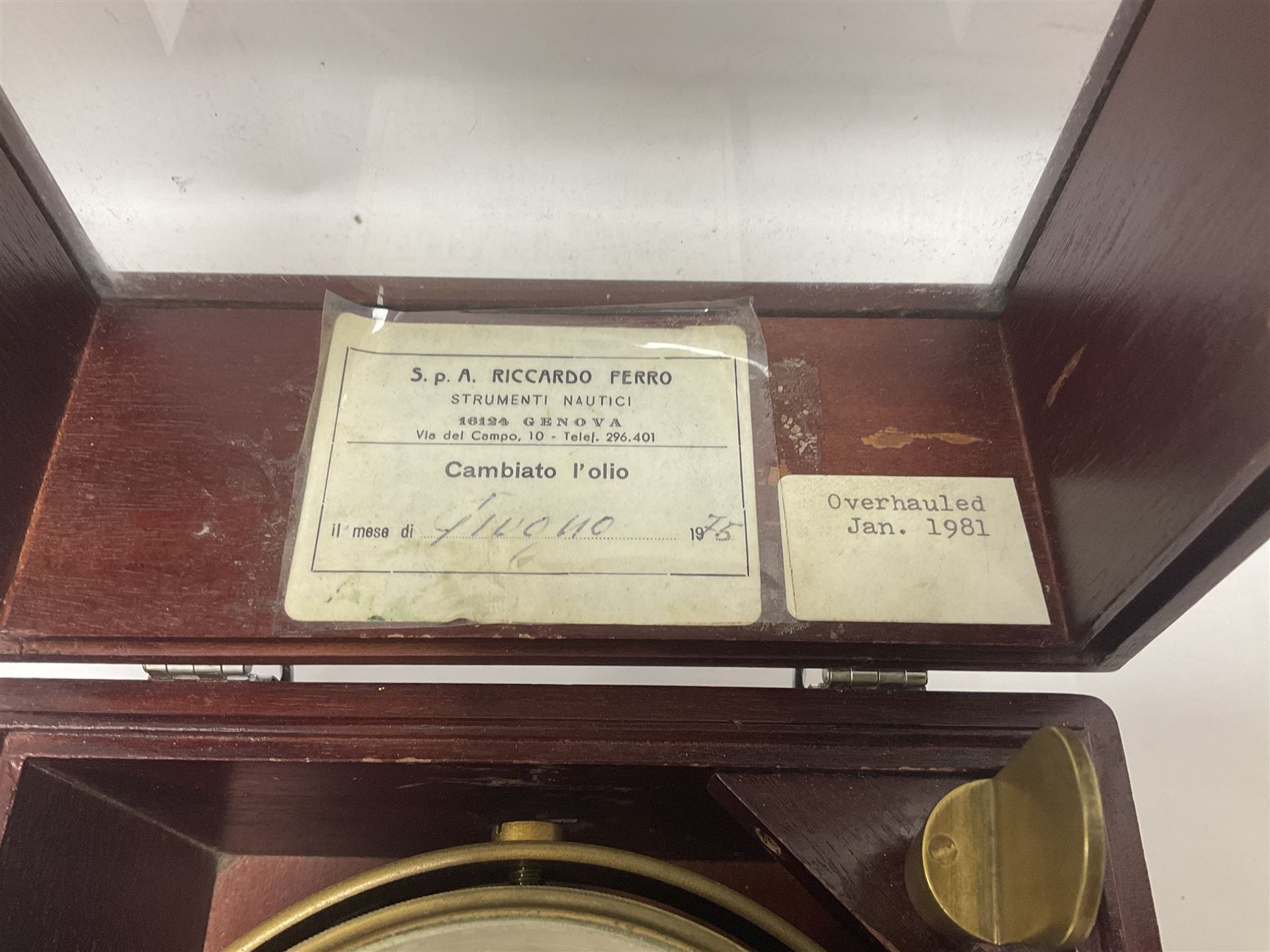 Two-day marine chronometer, with silvered dial inscribed Thomas Mercer Ltd, St Albans, contained within a brass gimbal-mounted bowl and glazed mahogany case, with applied brass plaque reading 'supplied by Kelvin Hughes no. 24295', brass winding key and two service notes to interior of case, dial D12cm, wooden case H17.5cm 