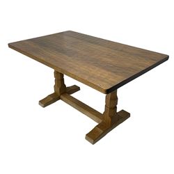 Mouseman - oak dining table, rectangular adzed top with rounded corners, octagonal pillar supports on sledge feet united by floor stretcher, carved with mouse signature, by the workshop of Robert Thompson, Kilburn