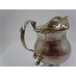 George III silver pedestal cream jug, with acanthus capped scroll handle, the body with lightly hammered and stipple decoration, upon circular foot, hallmarked Ann Smith & Nathaniel Appleton, London 1779, H11cm