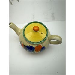 Clarice Cliff Bizarre 'Crocus' pattern teapot, H10cm, together with a Clarice Cliff Bizarre 'Crocus' pattern plate, D23cm, each with Crocus and Bizarre marks beneath, (2)