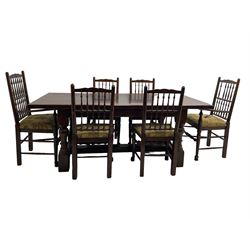 Oak refectory dining table, rectangular cleated top on turned supports joined by H-stretcher; together with set of six (4+2) oak spindle back dining chairs, with upholstered drop-on seat cushions, turned supports joined by turned stretchers