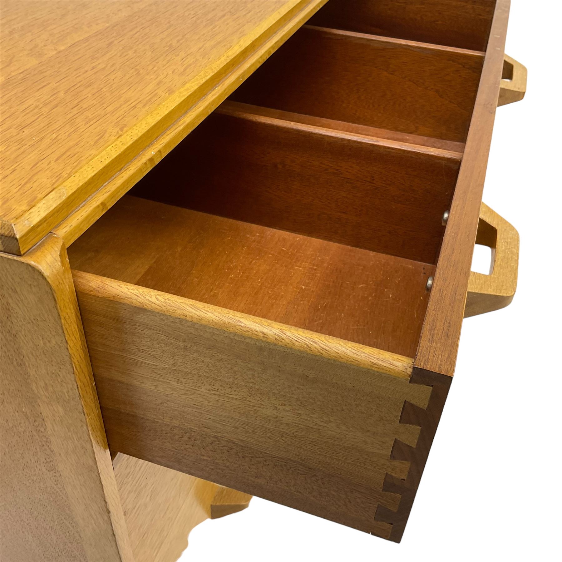 E. Gomme for G-Plan - 'Brandon' light oak chest, fitted with four long drawers, on skirted base