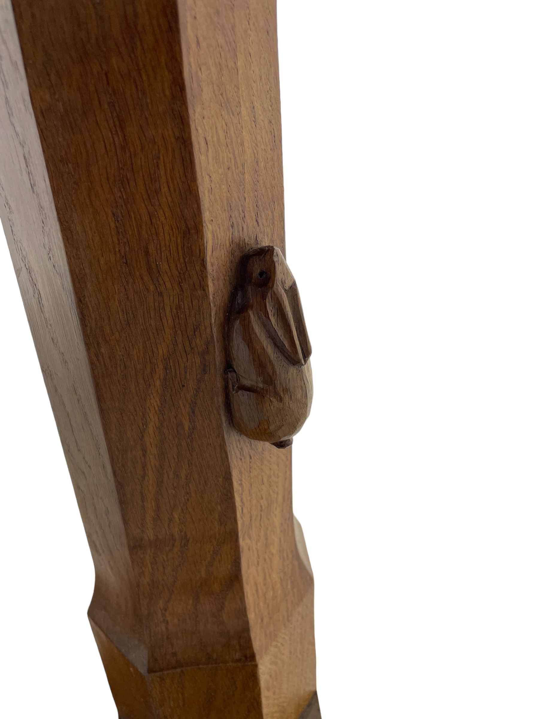 Rabbitman - oak dining table, rectangular adzed top, twin octagonal pillar supports on sledge feet, united by floor stretcher, carved with rabbit signature, by Peter Heap of Wetwang 