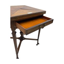 Victorian rosewood envelope games table, the moulded square top with four triangular hinged leaves, revealing inset baize playing surface and sunken counter wells, fitted with single frieze drawer, on square tapering supports united by x-framed stretchers and turned central column, on brass and ceramic castors 