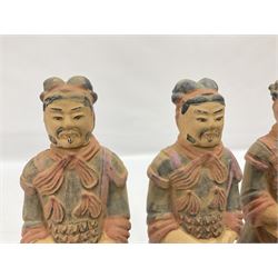 Set of three painted Chinese 'Terracotta Warrior' style figures, H20cm