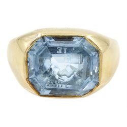 Early 20th century 18ct gold bezel set octagonal cut aquamarine intaglio ring, with Cupid ...