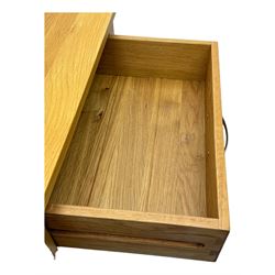 Contemporary light oak twin pedestal desk, fitted with three drawers over two cupboards with chrome handles, the central drawer with hinged front panel revealing pull-out keyboard tray, on plinth base