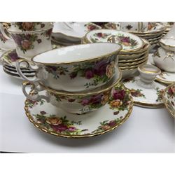 Royal Albert Old Country Roses pattern part tea and dinner service, to include two tureens, eight dinner plates, six side plates, twelve bowls, two mugs, seven teacups and saucers, milk jug,  twelve cake plates, six soup bowls and saucers, candlesticks, etc (95)