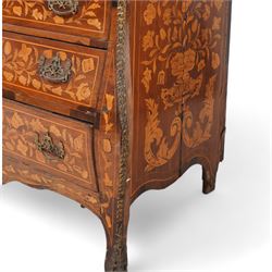 18th century Dutch marquetry walnut and gilt metal mounted vitrine cabinet on chest, shaped pediment carved with scrolling foliage cartouche, inlaid with trailing leafy branches and flower heads, two internal shelves enclosed by two glazed doors, the lower section with bombe outline fitted with three drawers, with ornate cast gilt metal edging and terminal caps