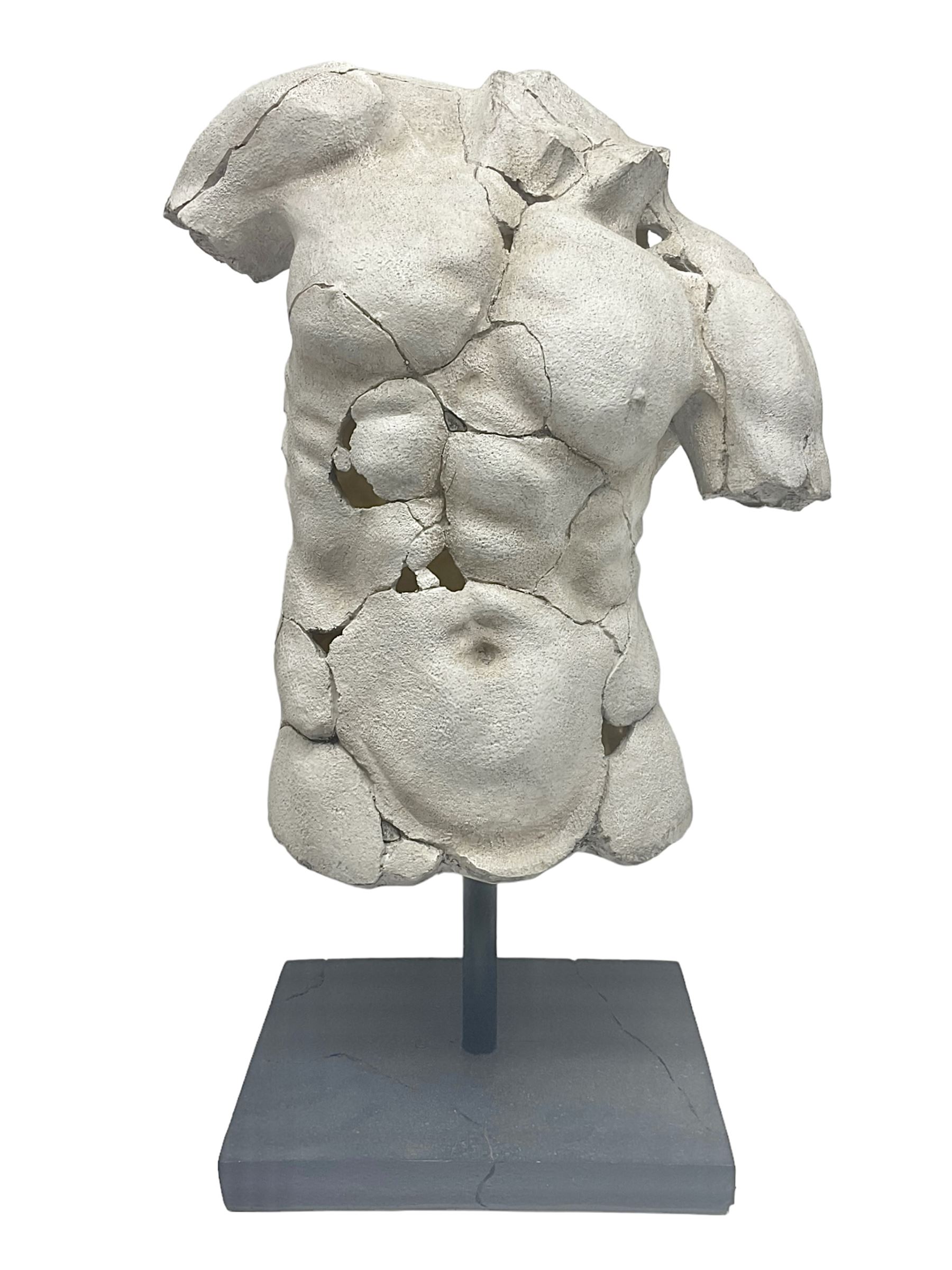 Composite sculpture of a Classical male torso on a stand, H65cm