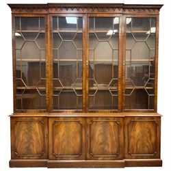 Bevan Funnell - Georgian design mahogany breakfront bookcase, moulded dentil and arcaded frieze over four astragal glazed doors, four cupboards below enclosed by figured doors, on skirted base