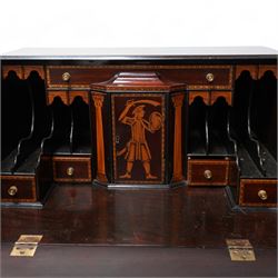 19th century inlaid mahogany bureau on stand, sloped moulded lid inlaid with shell motifs and parquetry bands, the interior fitted with drawers, small cupboard and document divisions, inlaid with soldier holding sword and shield flanked by classical columns, the stand fitted with single drawer over shaped apron inlaid with shell, on square tapering supports  