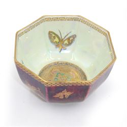 Wedgwood Fairyland Butterfly lustre hexagonal bowl, decorated with butterflies to the interior and purple ground exterior, with printed portland vase mark beneath, D11cm
