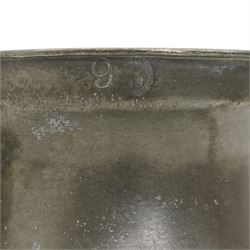 18th century pewter tankard, circa 1770, with scroll handle and acanthus leaf thumbpiece, touch marks and crowned X, H13cm, together with a Victorian 1/2 pint pewter measure, touch marks, weights and measures inspector verification mark (2)