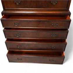 Georgian design figured walnut chest-on-chest, projecting cornice over nine graduating cock-beaded drawers, on cabriole feet 