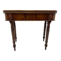 19th century mahogany tea table, fold-over swivel action rectangular top with rounded corners, figured frieze with stepped lozenge mounts, on turned supports